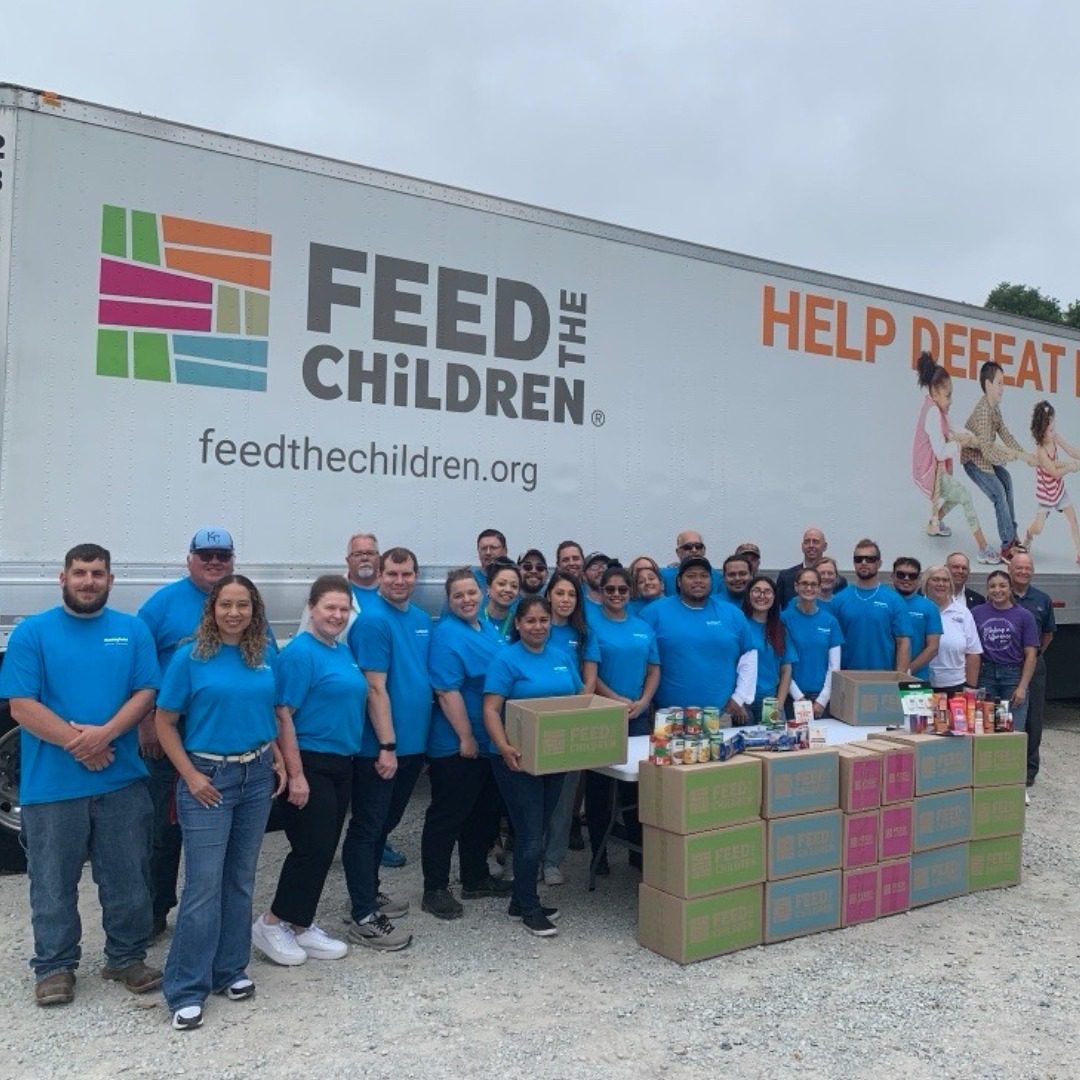 Smithfield Foods and Feed the Children distribute food and school supplies in local communities