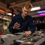 Galesburg Native Conducts Maintenance on a Bomb Rack Unit Aboard USS Harry S. Truman